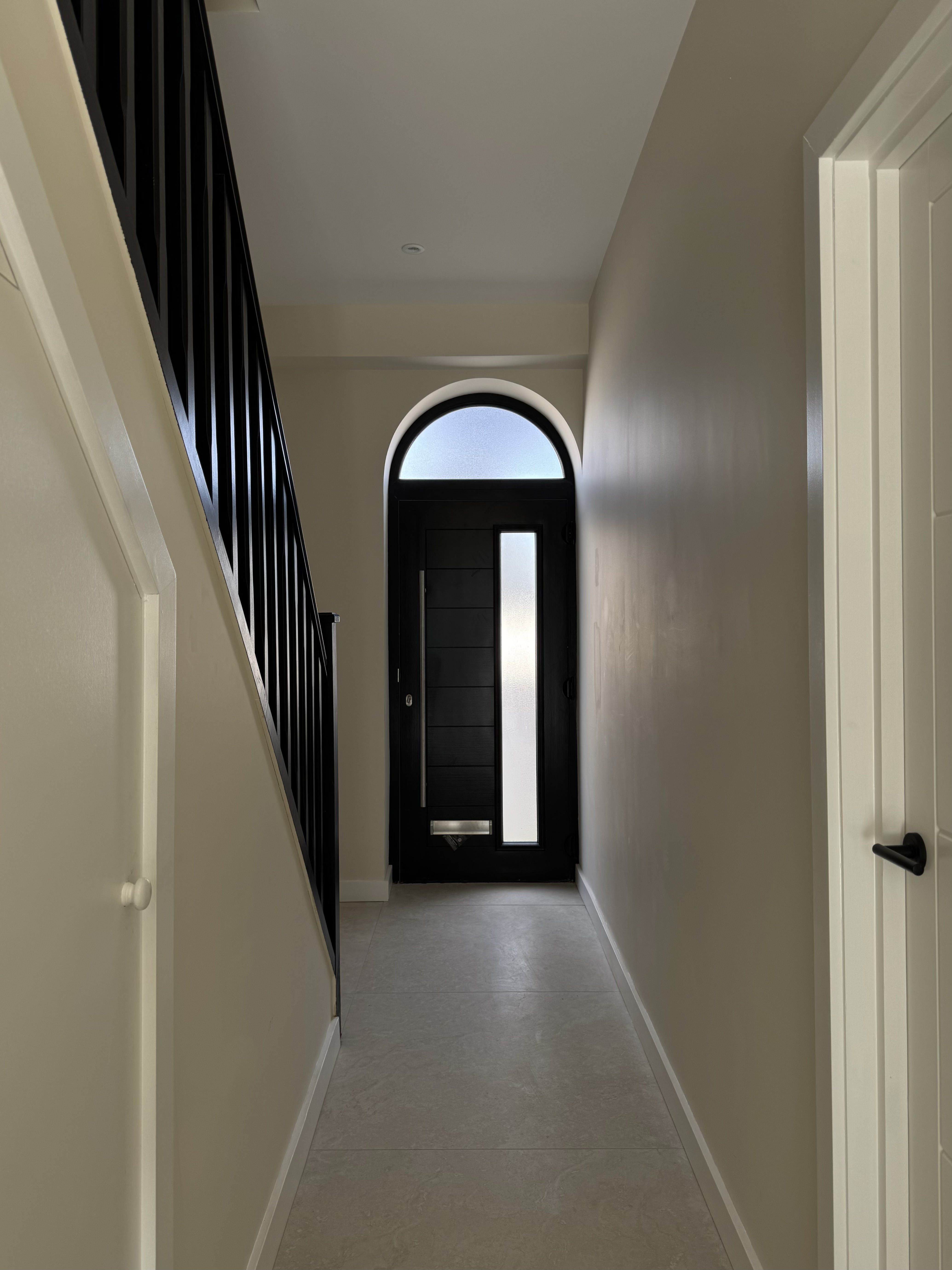 Hallway arched front door